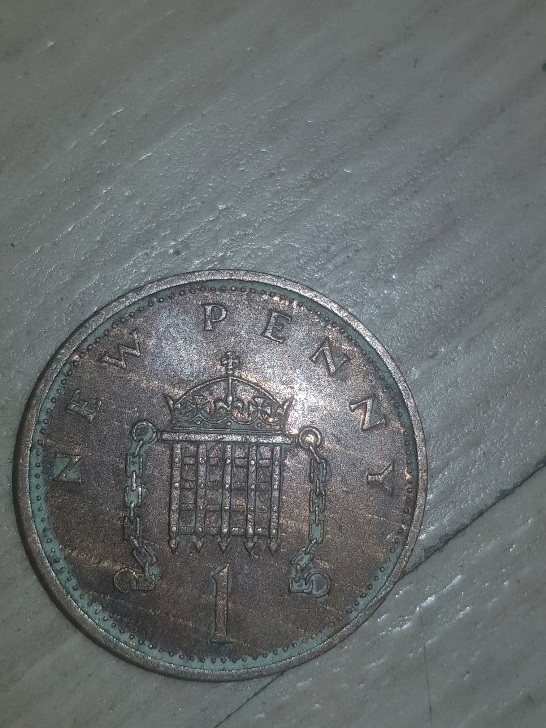 Half-Penny-Strike-Error-Or-Just-A-Old-Damaged-Coin